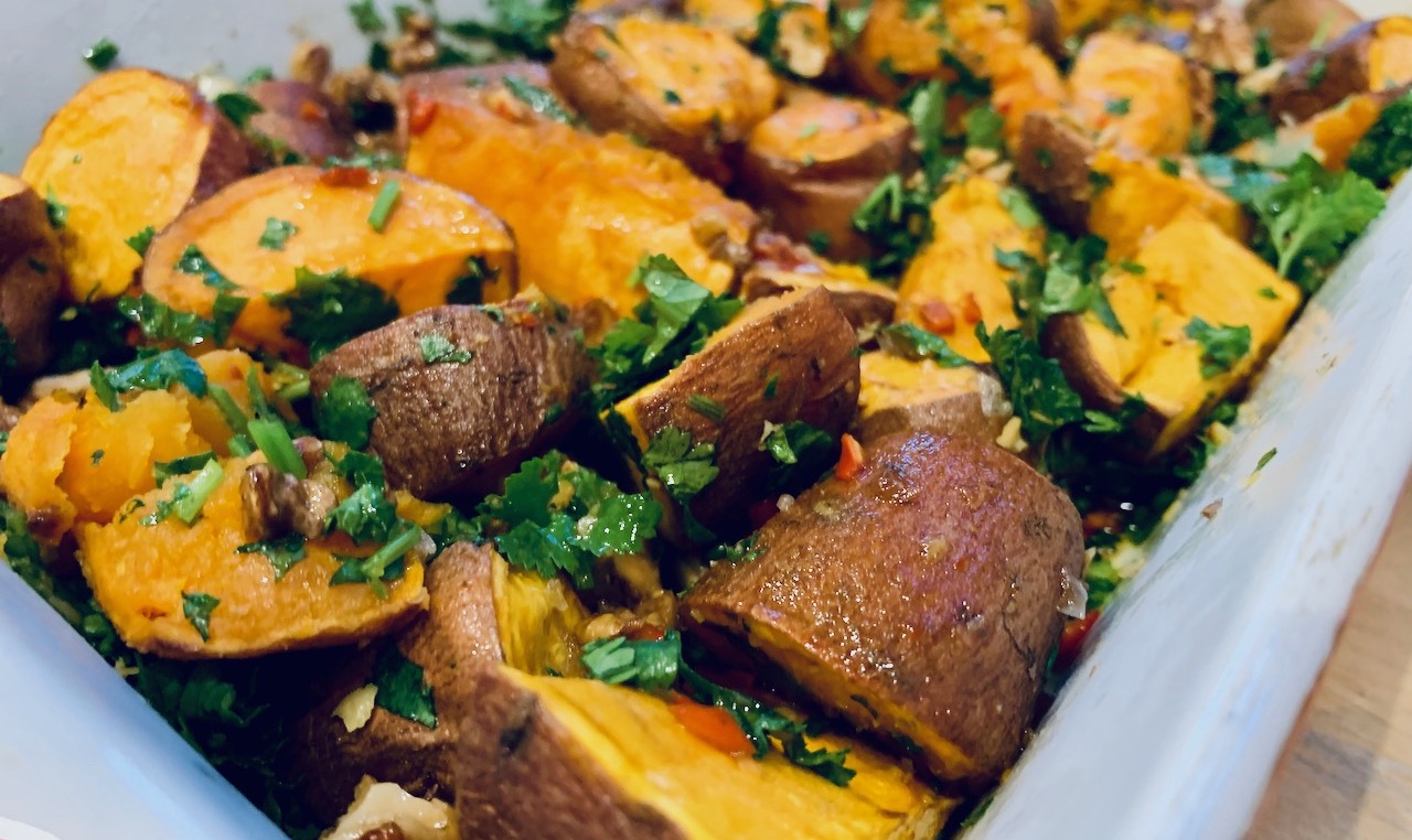 Roasted Sweet Potato in a Herb and Nut Salad, with Maple Chilli Dressing